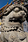 Bangkok Grand Palace, statue of chinese Guardian Lion at the entrance of the Phra Maha Monthian Group. 